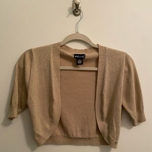 Wet seal shimmery, gold shrug/cropped short sleeve sweater.
